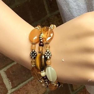 NWOT Stone Bracelet in the colors of Tan, Beige, And Silver
